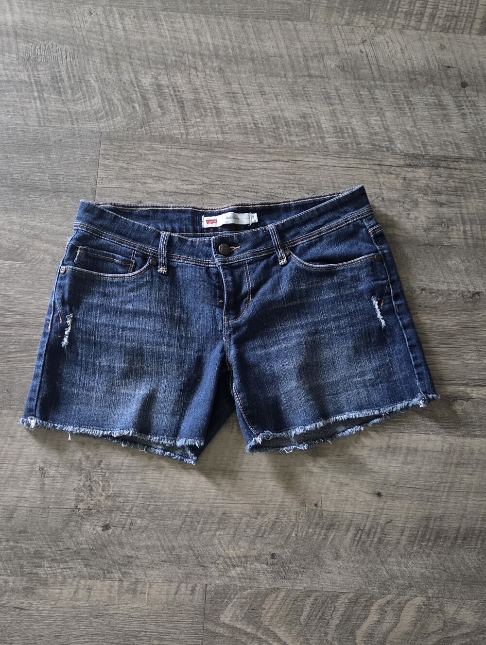 Levi's Dark Blue Cutoff Denim Shorts.